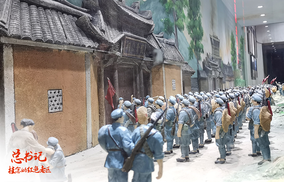 这是在福建省长汀县中复村拍摄的红军长征出发动员会微型雕塑(2021年4月27日摄)。